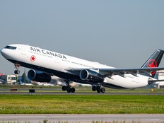 An Air Canada jet leaves the runway