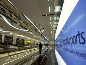 A man walks towards the departure lounge at Dubai International Airport's Terminal 3 on October 9, 2008.
