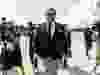 Former U.S. Rep. George Santos arrives at court in Central Islip, N.Y., Aug. 19, 2024.