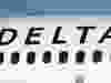The company logo graces the side of a Delta Air Lines jetliner at Denver International Airport in Denver, on June 26, 2019.