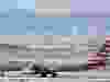 FILE - An American Airlines jetliner rumbles down a runway at Denver International Airport, Jan. 16, 2024, in Denver.