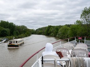A view from the Colonial Belle as it travels east on the Erie Canal in Pittsford, New York, this month. The canal connects Buffalo in western New York to Albany, the capital, in the east.