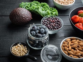 bowls of berries and nuts