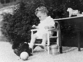 Charles Lindbergh Jr playing with his toys