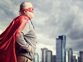 senior man with red cape