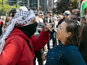 Protesters arguing.