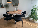 The EQ3 Mesa Round Dinette Table with oak top and white powder-coated base.