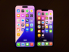 iPhone 16 (left) and iPhone 16e (right) inside, both at max brightness.